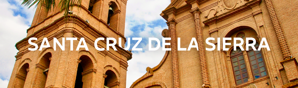 Imagem da Catedral Basílica de San Lorenzo com o nome "Santa Cruz de La Sierra" escrito em letras garrafais brancas